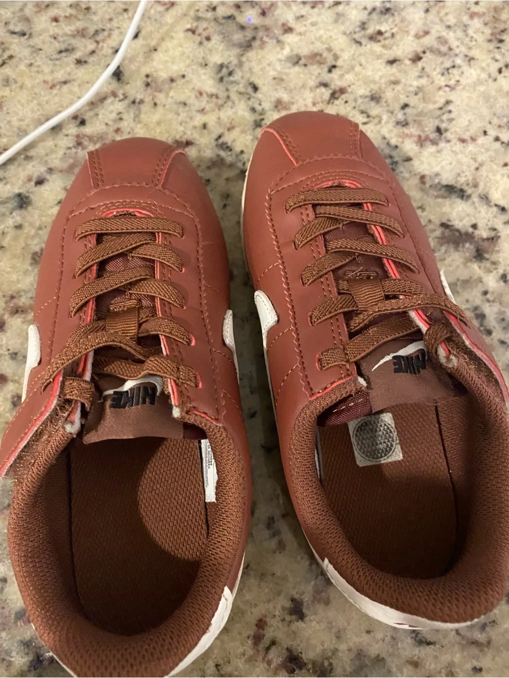 Nike laces swoosh